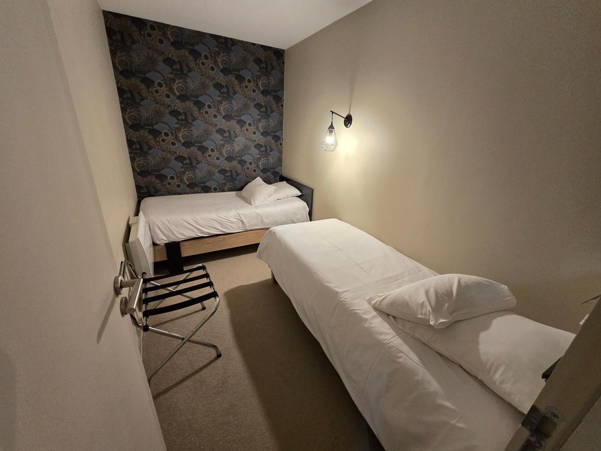 Au Loup Historic Aparthotel Bayeux
